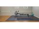 Finished basement featuring workout equipment on gym flooring at 3916 S Martin Way, Lithia Springs, GA 30122