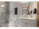 Elegant bathroom with a glass-enclosed shower, marble countertop, and stylish fixtures, creating a spa-like experience at 3916 S Martin Way, Lithia Springs, GA 30122
