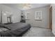 Bedroom featuring a ceiling fan, neutral walls, and carpet floors at 3916 S Martin Way, Lithia Springs, GA 30122