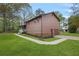 Spacious home with attached garage and well-maintained lawn at 3916 S Martin Way, Lithia Springs, GA 30122
