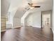 Spacious bonus room features recessed lighting, hardwood floors, and a ceiling fan at 1010 Allenbrook Ln, Roswell, GA 30075