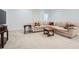 Cozy living room area with carpet and comfortable furnishings at 4503 Payton Oaks Ne Pl, Atlanta, GA 30345