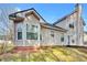 Exterior view of the back of the home, with a bay window and lots of natural light at 4720 Buffalo St, Fairburn, GA 30213