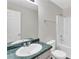 Standard bathroom with a vanity, mirror, and shower at 4720 Buffalo St, Fairburn, GA 30213