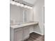 This bathroom includes a large mirror and vanity area at 4720 Buffalo St, Fairburn, GA 30213
