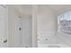 Bright bathroom includes a shower, and a large soaking tub at 4720 Buffalo St, Fairburn, GA 30213