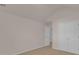 Bright bedroom featuring double closets, neutral walls, and soft carpeting at 4720 Buffalo St, Fairburn, GA 30213