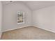 Simple bedroom with a large window and ample natural light at 4720 Buffalo St, Fairburn, GA 30213