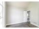 Bedroom features gray carpet, paint, and trim, plus lots of natural light from a large window at 4820 Camden Sw Dr, Conyers, GA 30094