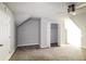Bedroom features gray carpet, paint, trim and a peek into a walk-in closet at 4820 Camden Sw Dr, Conyers, GA 30094