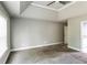 A bright bedroom features neutral walls, plush carpet, and high ceilings at 4820 Camden Sw Dr, Conyers, GA 30094