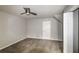 A bedroom features neutral walls, carpet, and ceiling fan at 4820 Camden Sw Dr, Conyers, GA 30094