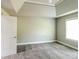 A bright bedroom features neutral walls, plush carpet, and high ceilings at 4820 Camden Sw Dr, Conyers, GA 30094