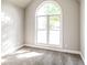 Bedroom showcases a large arched window for natural light at 4820 Camden Sw Dr, Conyers, GA 30094