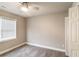 A bedroom features neutral walls, carpet, a window, and a closet at 4820 Camden Sw Dr, Conyers, GA 30094