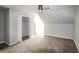 A bright bedroom features neutral walls, plush carpet, and closet at 4820 Camden Sw Dr, Conyers, GA 30094
