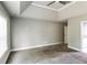 A carpeted bedroom has gray walls, a ceiling fan, and white trim at 4820 Camden Sw Dr, Conyers, GA 30094
