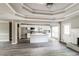 Open-concept living and kitchen area features a large island, modern appliances and fireplace at 4820 Camden Sw Dr, Conyers, GA 30094