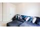 Stylish living room with a plush gray sectional sofa, decorative pillows, and neutral wall colors at 5715 Keys Way, Lithonia, GA 30058