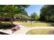 Community playground surrounded by lush greenery, providing a safe and fun space for children to play at 5715 Keys Way, Lithonia, GA 30058