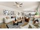 Inviting living area showcasing an open layout connected to the dining and kitchen spaces at 112 Maplewood Ln, Conyers, GA 30094