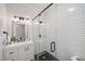 Modern bathroom featuring a glass enclosed shower, white subway tile, and vanity at 302 Rolling Rock Se Rd, Marietta, GA 30067