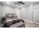 Cozy bedroom with neutral tones, plush bedding, and great natural light, complete with stylish decor at 302 Rolling Rock Se Rd, Marietta, GA 30067