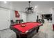 Spacious game room featuring a pool table, wet bar access, and recessed lighting at 302 Rolling Rock Se Rd, Marietta, GA 30067