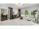 Luxurious main bathroom with soaking tub, vanity, and abundant natural light at 302 Rolling Rock Se Rd, Marietta, GA 30067