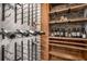 Spacious custom wine cellar with plenty of wine rack and shelving space for the wine enthusiast at 302 Rolling Rock Se Rd, Marietta, GA 30067