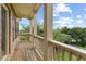 Balcony view with classic railing and picturesque view of lush greenery at 3241 Adams St, Atlanta, GA 30337