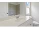 Bathroom featuring a white vanity with a single sink and tiled shower at 3241 Adams St, Atlanta, GA 30337