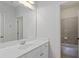 Bright bathroom with a white vanity, sink, a large mirror and a shower/tub combo at 3241 Adams St, Atlanta, GA 30337