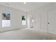 Bright bedroom with neutral carpet and a view to the bathroom at 3241 Adams St, Atlanta, GA 30337