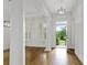 Bright foyer with hardwood floors, white trim, and abundant natural light at 3241 Adams St, Atlanta, GA 30337