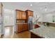 Spacious kitchen boasting a granite countertop, stainless appliances, and hardwood floors at 3241 Adams St, Atlanta, GA 30337