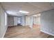 Large finished basement with wood-look floors, neutral walls, and open layout at 5254 Greenpoint Dr, Stone Mountain, GA 30088