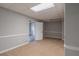 Basement with carpeted floors and access to another room at 5254 Greenpoint Dr, Stone Mountain, GA 30088