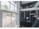 Shower with black subway tile and outside view from the window at 5254 Greenpoint Dr, Stone Mountain, GA 30088