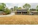 Charming two-story home featuring a welcoming front porch and an attached two-car garage at 5254 Greenpoint Dr, Stone Mountain, GA 30088