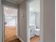 Hallway view showcasing the kitchen and bathroom at 5254 Greenpoint Dr, Stone Mountain, GA 30088