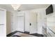Bedroom with an organized closet, decorative chandelier, and a TV at 6025 Golf View Xing, Locust Grove, GA 30248
