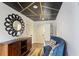 Stylish hallway with decorative ceiling, wood furniture, and a comfortable seating area at 6025 Golf View Xing, Locust Grove, GA 30248