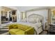 Luxurious primary bedroom suite with an ensuite lounge area and fireplace at 6025 Golf View Xing, Locust Grove, GA 30248