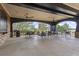 Spacious outdoor patio with ceiling fans, seating area and picturesque views of the surrounding landscape at 6025 Golf View Xing, Locust Grove, GA 30248