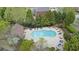 Aerial view of a community pool with lounge chairs at 6025 Golf View Xing, Locust Grove, GA 30248
