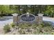 Stone monument sign for Heron Bay Golf & Country Club at 6025 Golf View Xing, Locust Grove, GA 30248
