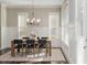 Elegant dining room with a modern table, stylish chairs, and ample natural light at 1329 Booth Ave, Atlanta, GA 30318