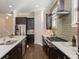 Modern kitchen featuring stainless steel appliances, sleek countertops, and stylish cabinetry at 1329 Booth Ave, Atlanta, GA 30318