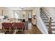 Open-concept living room with hardwood floors, ceiling fan, and modern furnishings at 1329 Booth Ave, Atlanta, GA 30318